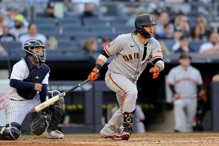 SF Giants shortstop Brandon Crawford follows through on a double against the New York Yankees. (2023)